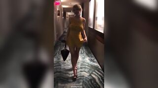 Busty Blonde Removes Dress In Hotel Hallway