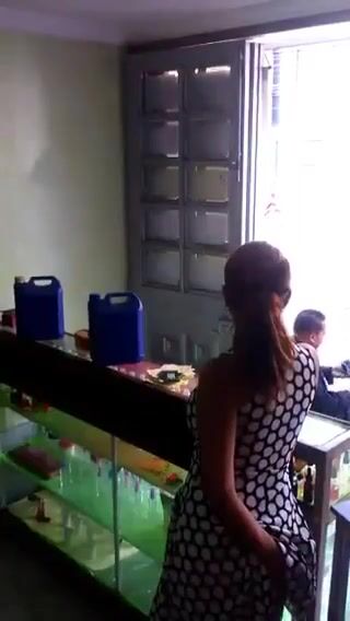 Stealth blowjob behind transparent glass.