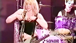 Courtney Love rocking out with her tits out