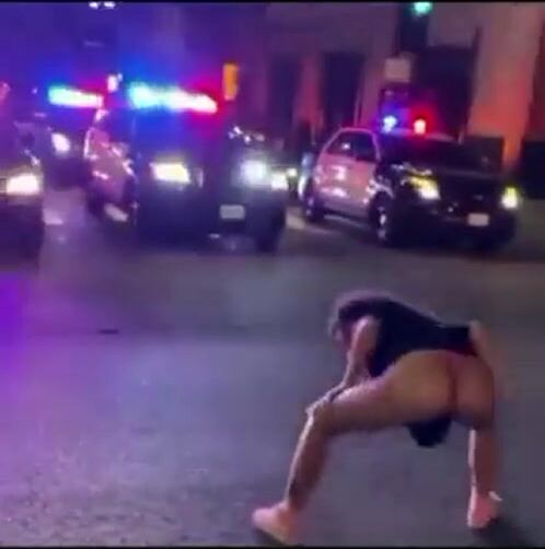 In front of the cops