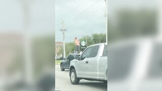 Jilling On The Top of a Car in Traffic