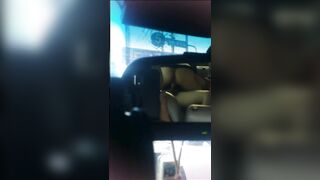 in the backseat of a taxi during a traffic jam