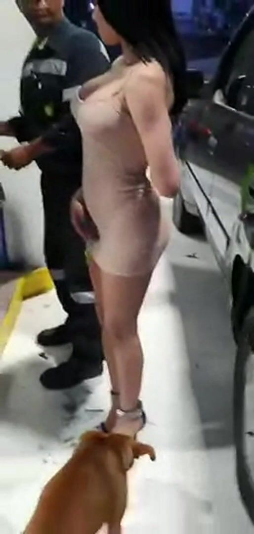Showing Ass While Filling Gas